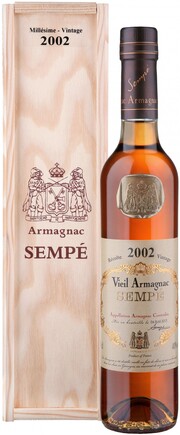 In the photo image Millesime, Armagnac AOC, 2002, wooden box, 0.5 L